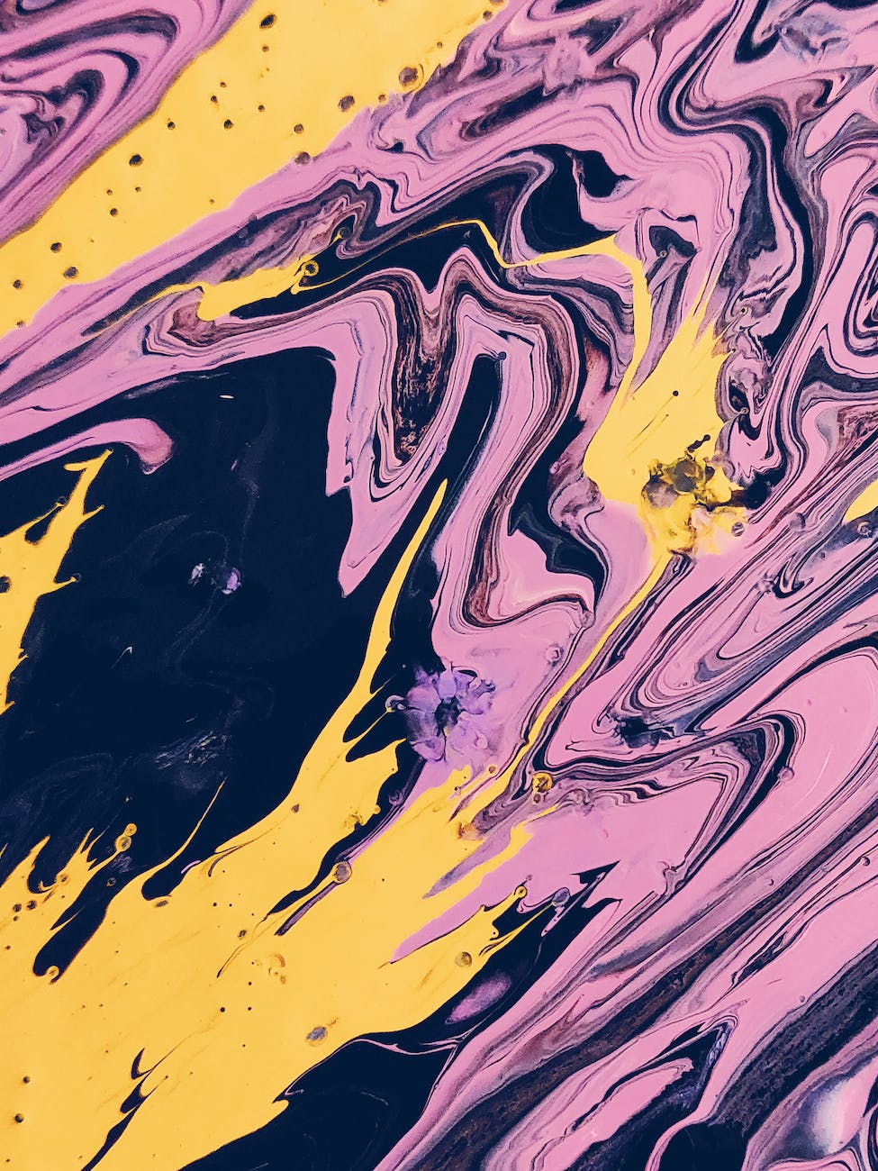 pink black and yellow abstract painting